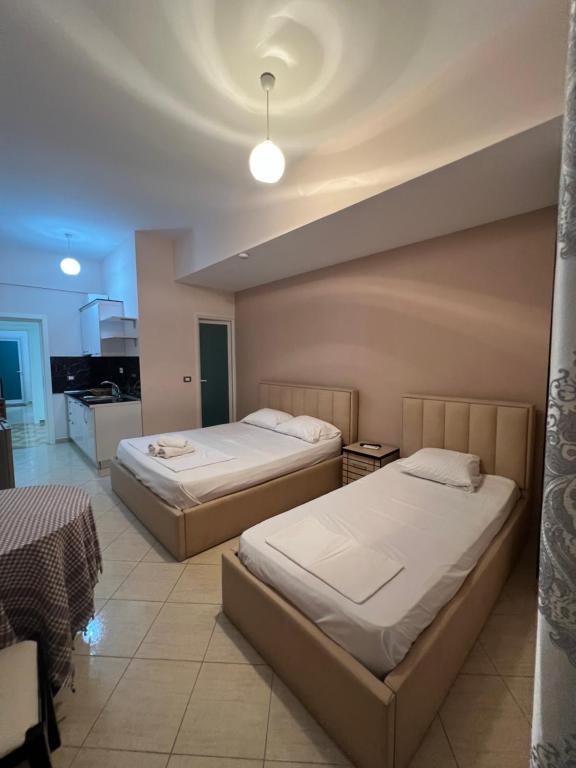 Postel nebo postele na pokoji v ubytování Hotel Villa Flowers 2