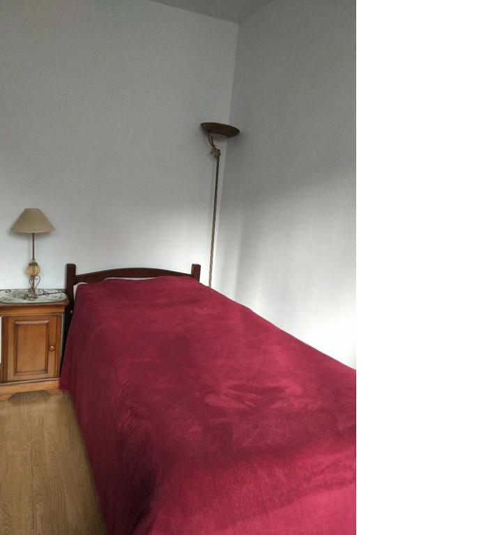 Ένα ή περισσότερα κρεβάτια σε δωμάτιο στο Chambre 5 minutes de la gare à pieds