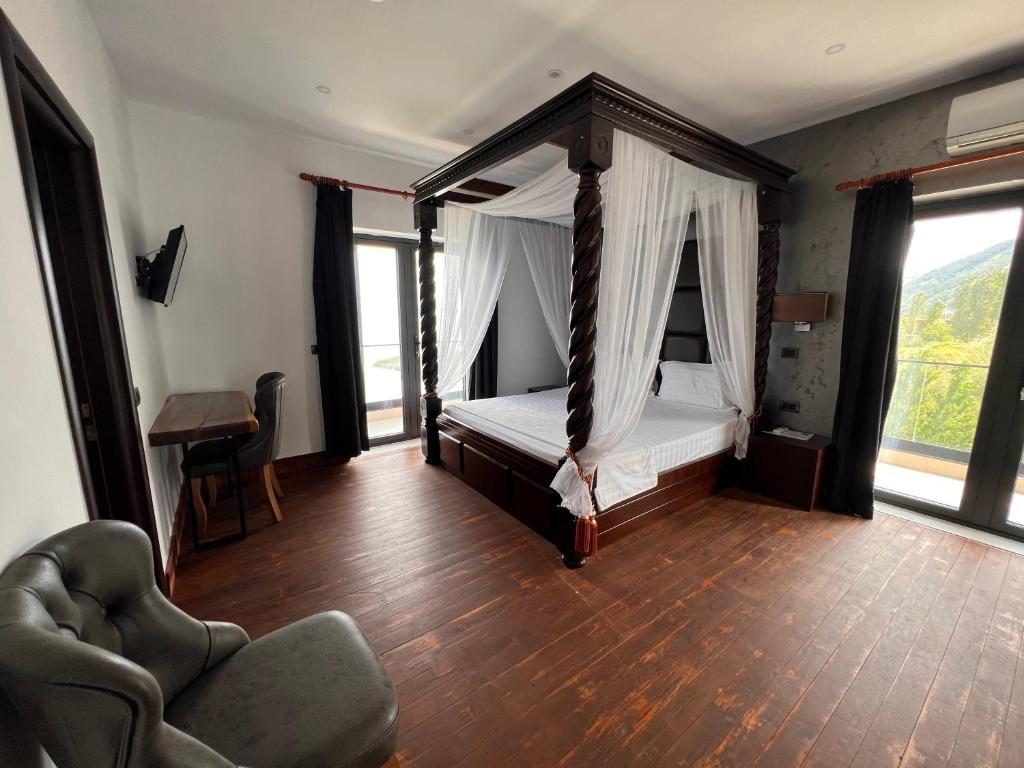 Voodi või voodid majutusasutuse Hotel Victoria toas