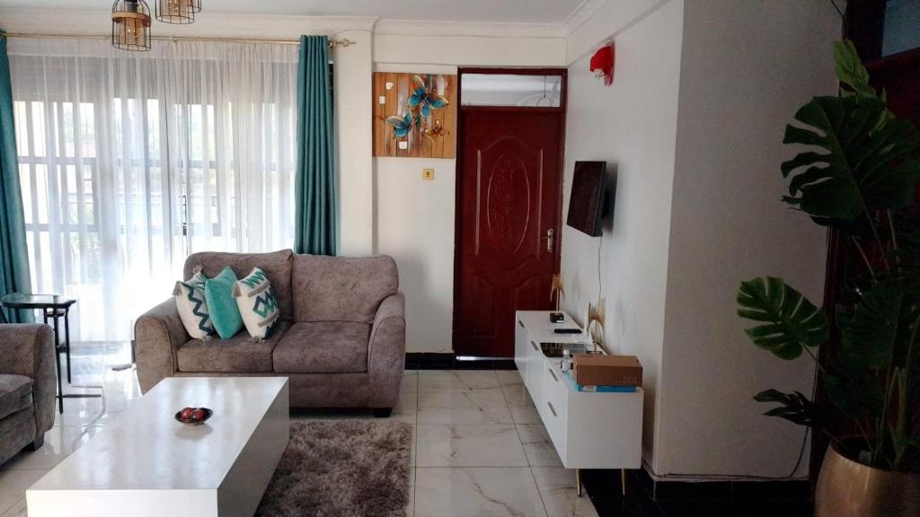 Posezení v ubytování Bomani -3 Nati Apartment