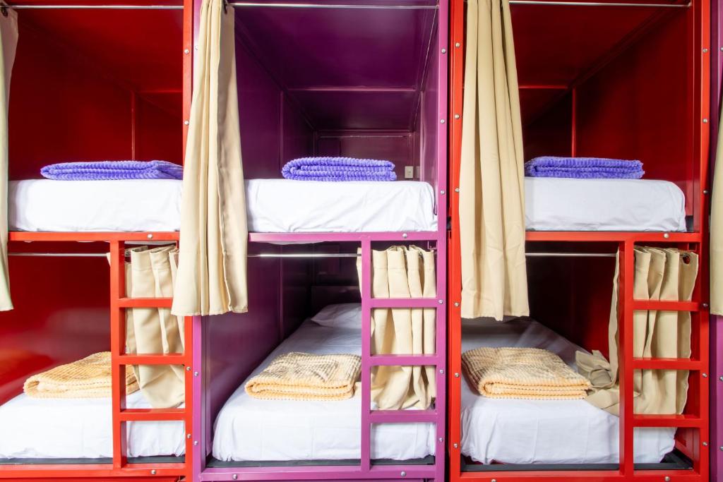 Ένα ή περισσότερα κρεβάτια σε δωμάτιο στο Hostel Bemaro Mexico City
