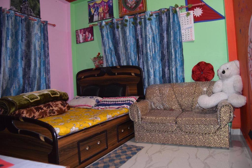 Posezení v ubytování Laxmi Homestay