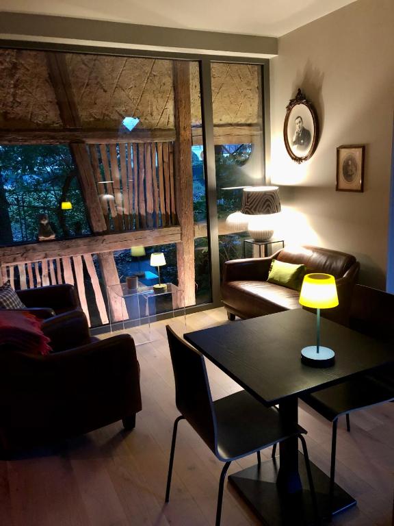 Posezení v ubytování B&B Le Lodge