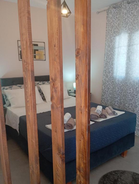 A bed or beds in a room at Natasa Studio
