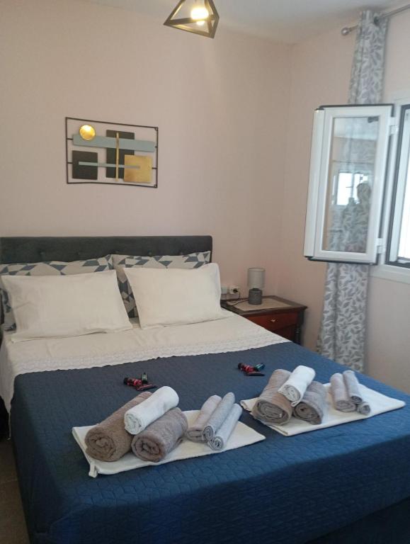 A bed or beds in a room at Natasa Studio