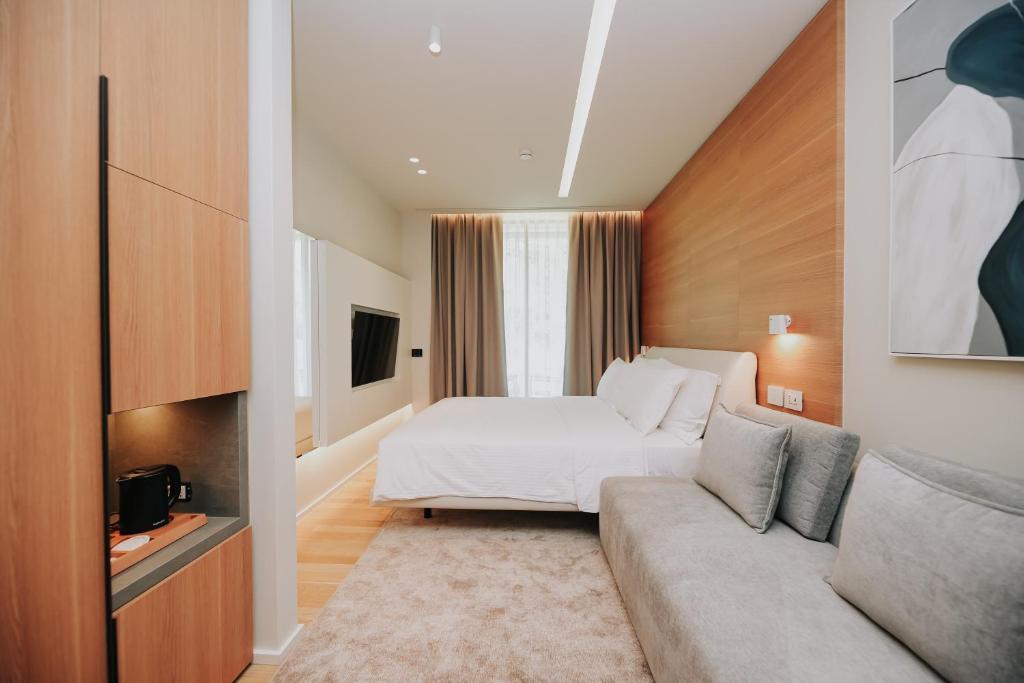 TV a/nebo společenská místnost v ubytování Magnus Hotel