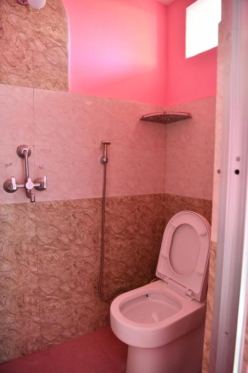 Koupelna v ubytování Laxmi Homestay