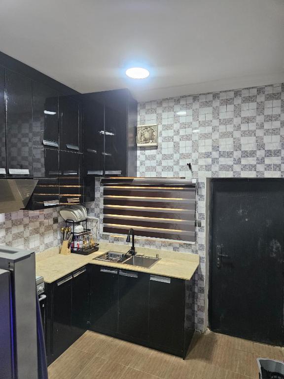 Kuchyň nebo kuchyňský kout v ubytování Ambiance abodes