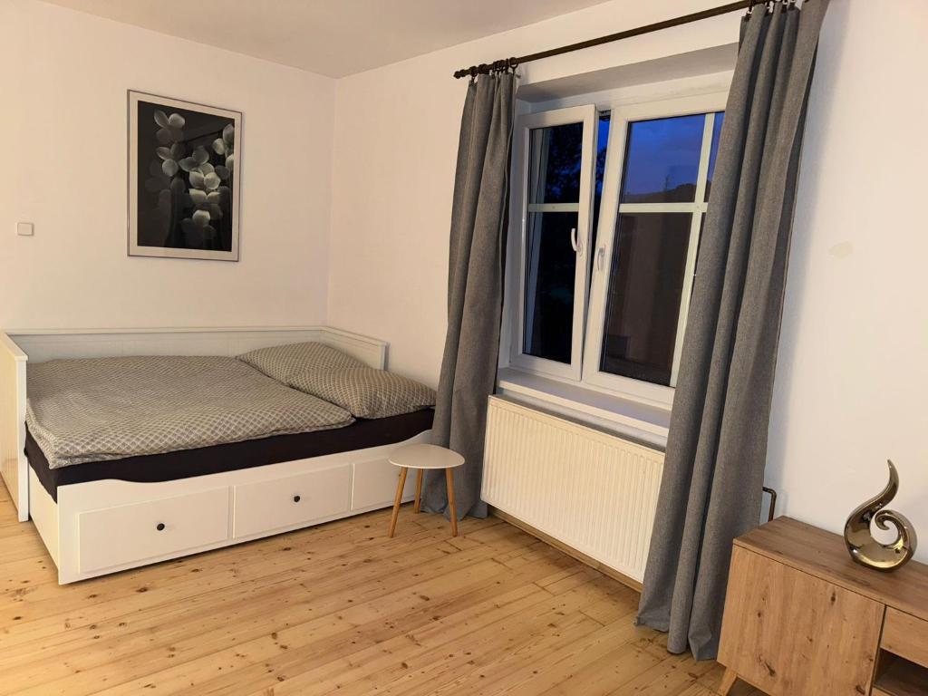 Postel nebo postele na pokoji v ubytování Apartmány Kanteho grunt