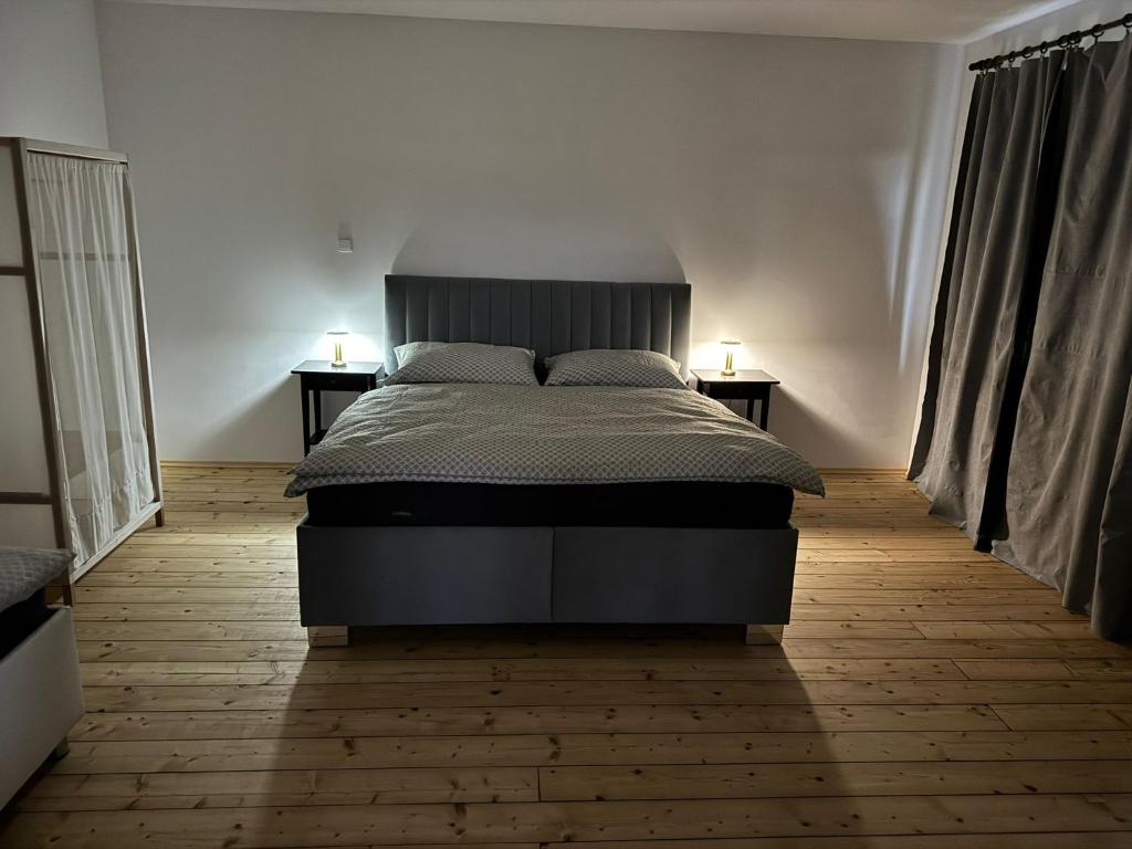 Postel nebo postele na pokoji v ubytování Apartmány Kanteho grunt
