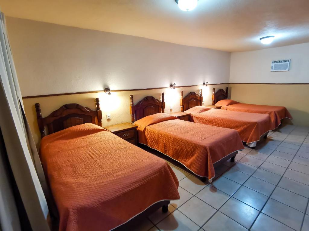 Hotel El Nogalito - Habitación Cuádruple Deluxe