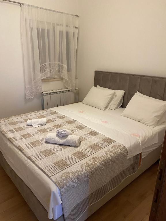 Posteľ alebo postele v izbe v ubytovaní Apartment Sukosan 16641c