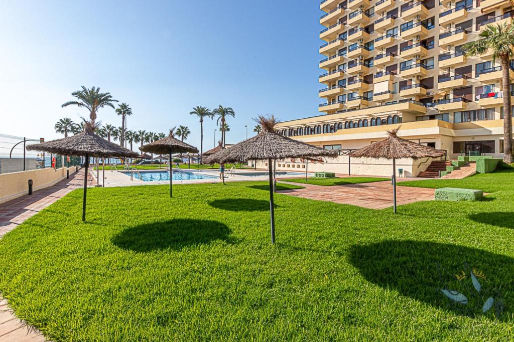 Bazén v ubytovaní Aloha Playa Apartment with panoramic sea view and pools alebo v jeho blízkosti