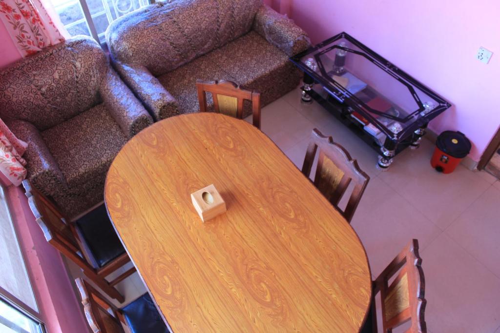 Posezení v ubytování Laxmi Homestay