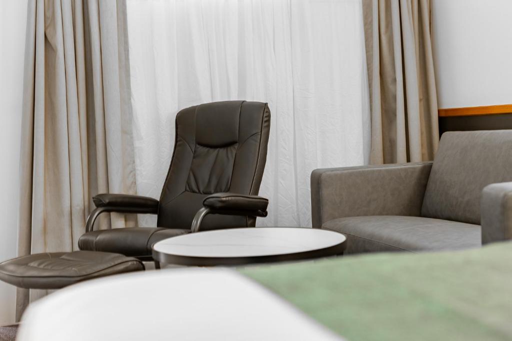 Posezení v ubytování Maraboon Motor Inn