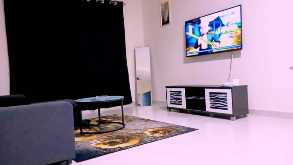 TV a/nebo společenská místnost v ubytování NR Homestay