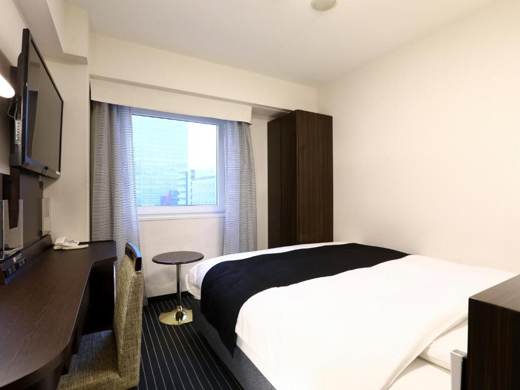 TV a/nebo společenská místnost v ubytování APA Hotel Akasaka Mitsuke
