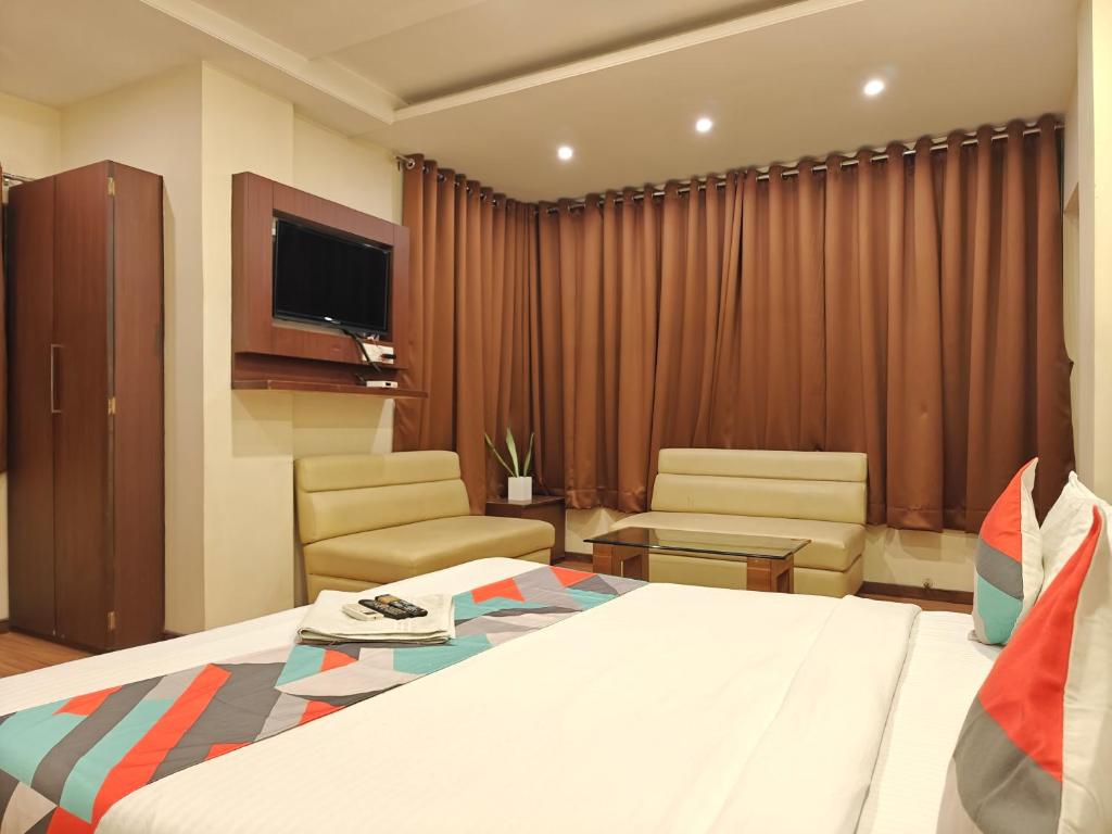 TV a/nebo společenská místnost v ubytování Loharkar Hotel