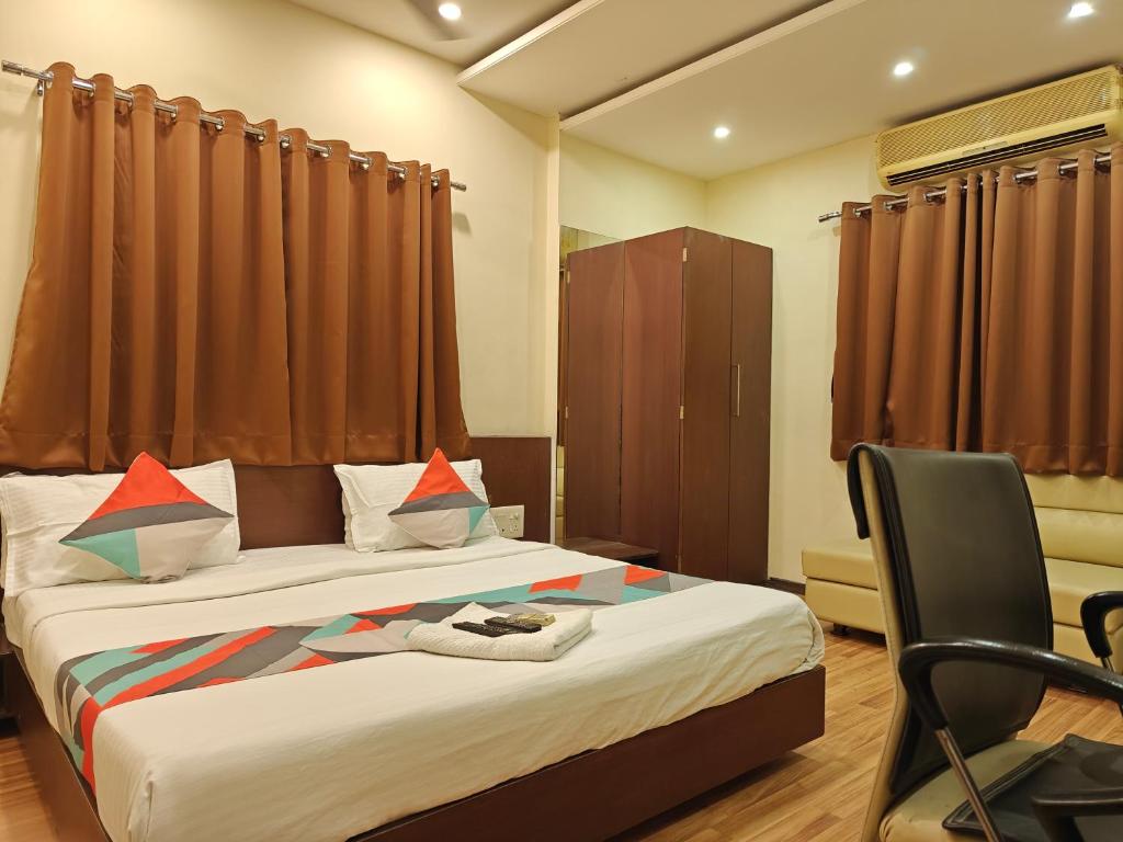 Postel nebo postele na pokoji v ubytování Loharkar Hotel