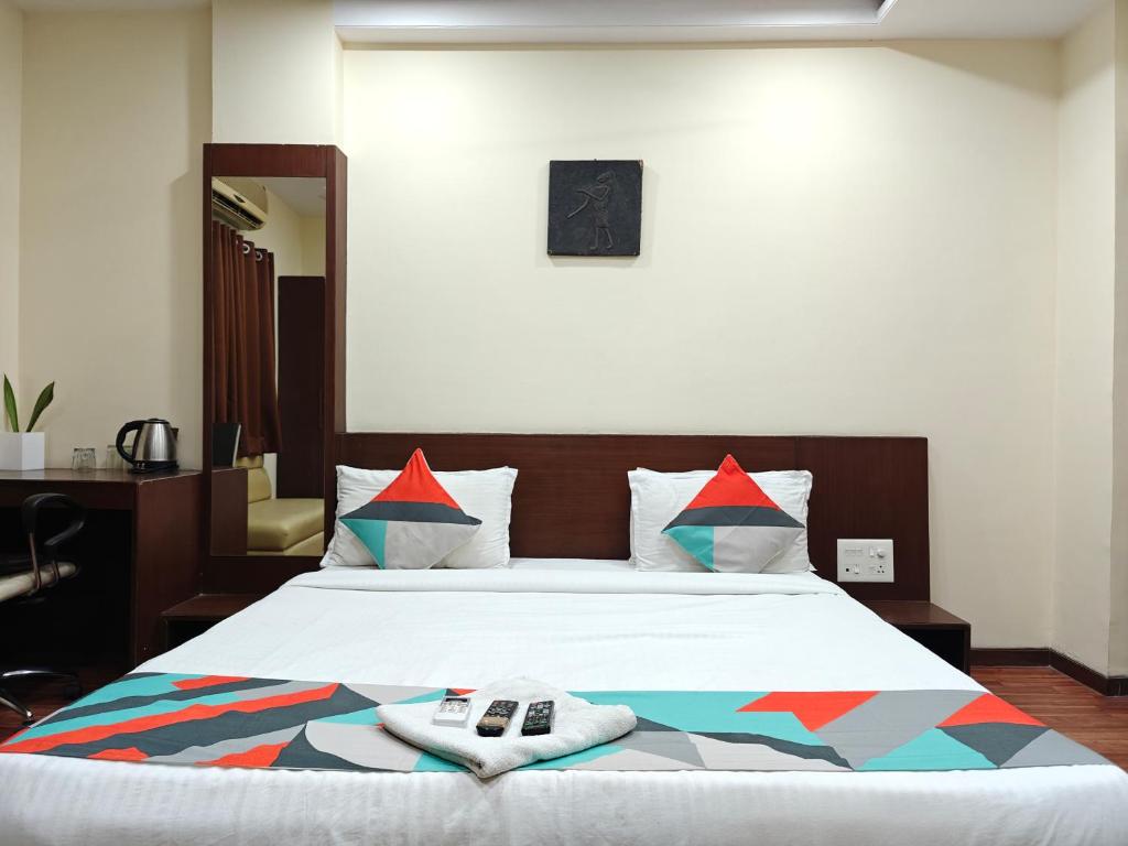 Postel nebo postele na pokoji v ubytování Loharkar Hotel