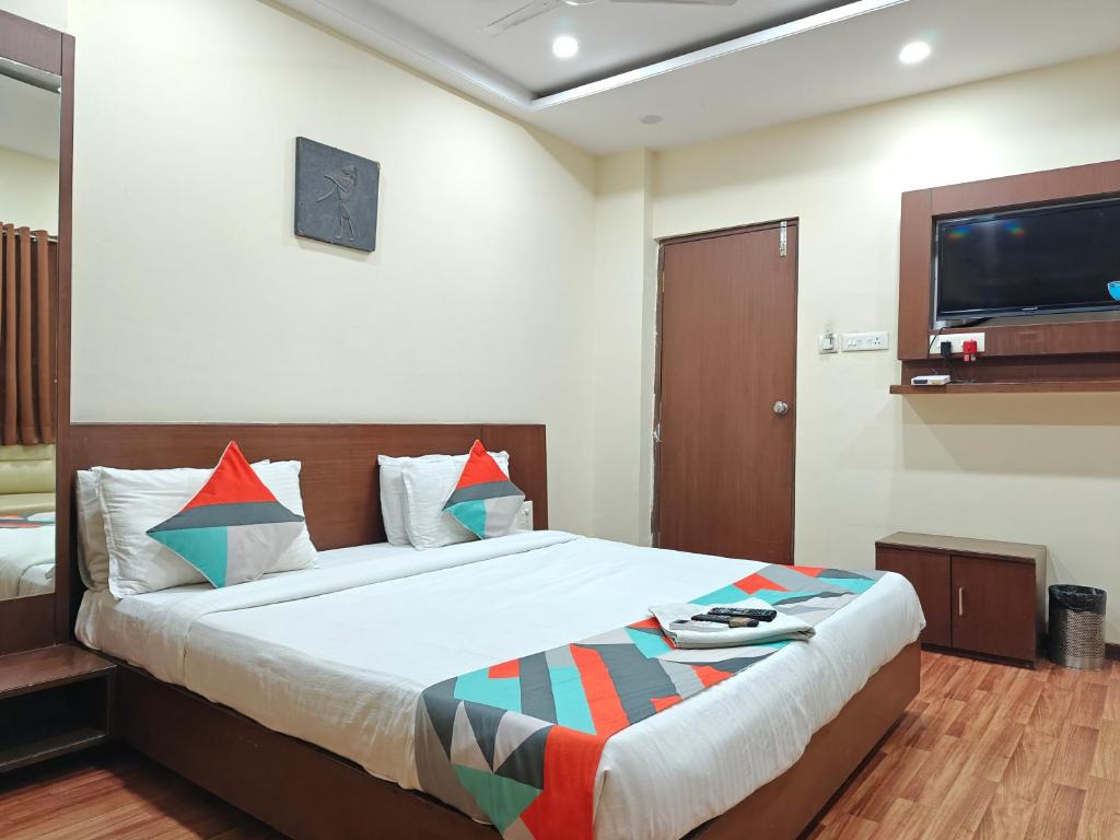 Postel nebo postele na pokoji v ubytování Loharkar Hotel