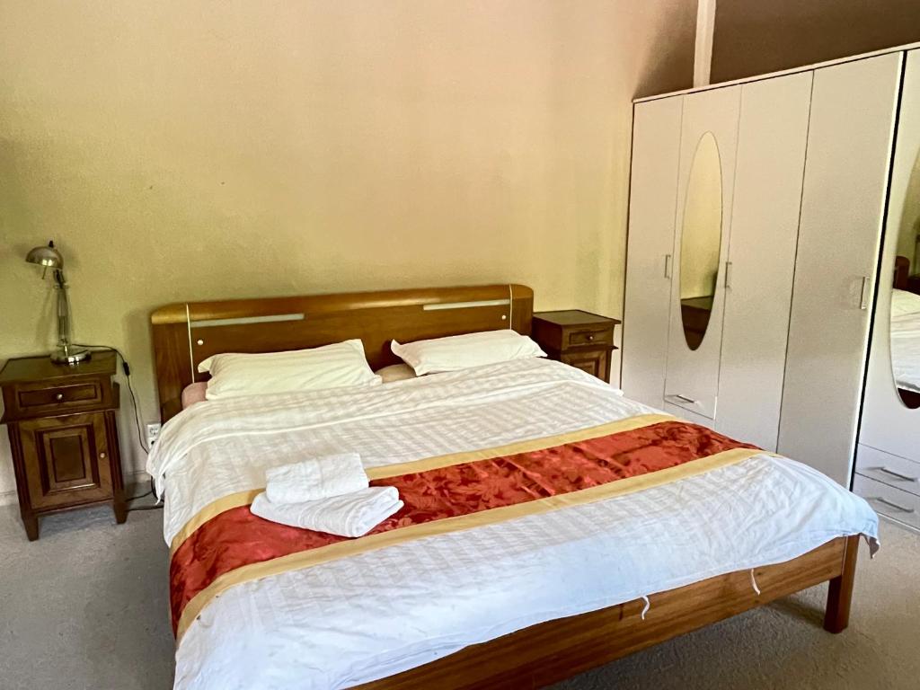 Postel nebo postele na pokoji v ubytování New Easy Home