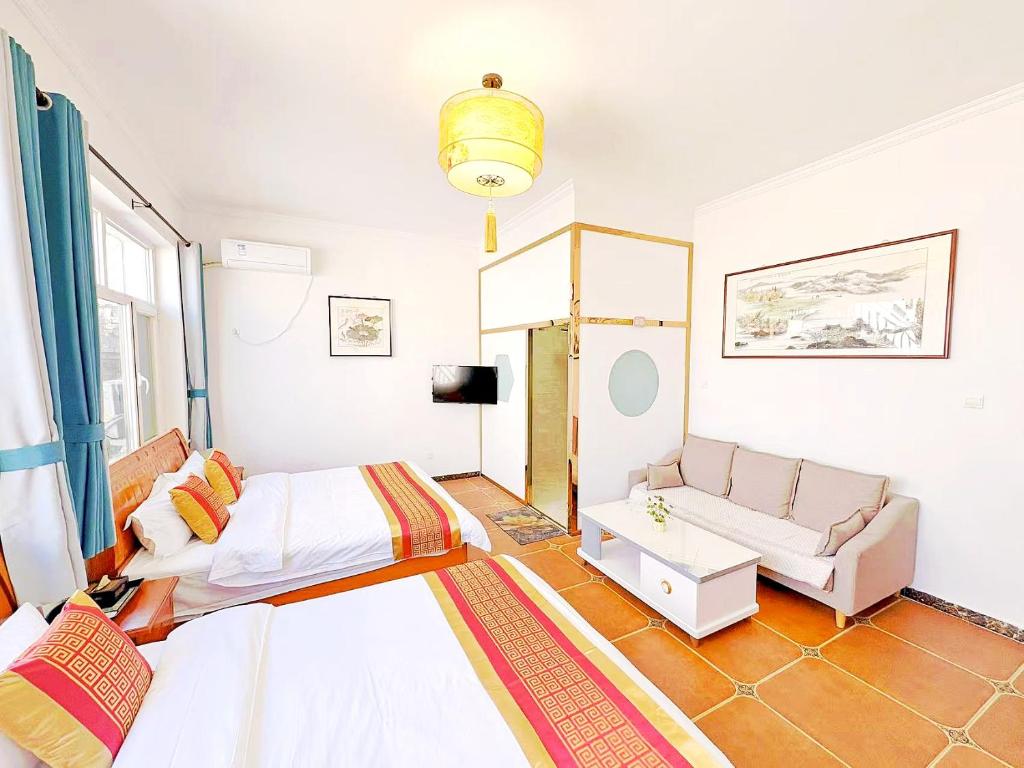 Postel nebo postele na pokoji v ubytování Beijing Great Wall Shiguang Homestay