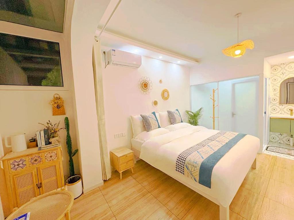 Postel nebo postele na pokoji v ubytování Beijing Great Wall Shiguang Homestay