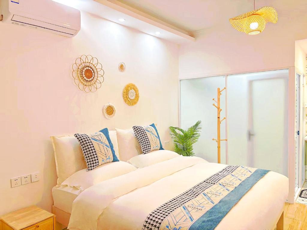 Postel nebo postele na pokoji v ubytování Beijing Great Wall Shiguang Homestay