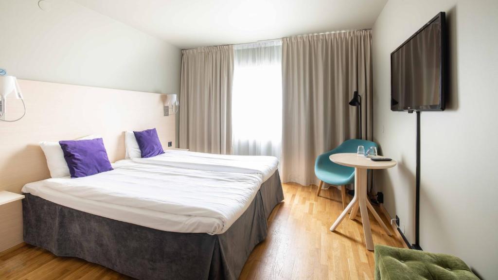 Postel nebo postele na pokoji v ubytování Quality Hotel Sundsvall
