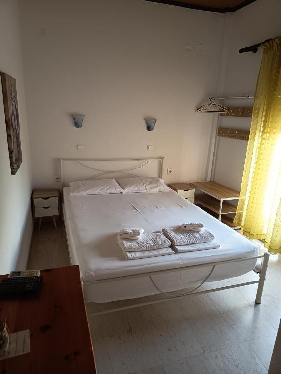 Postel nebo postele na pokoji v ubytování Soti's Rooms