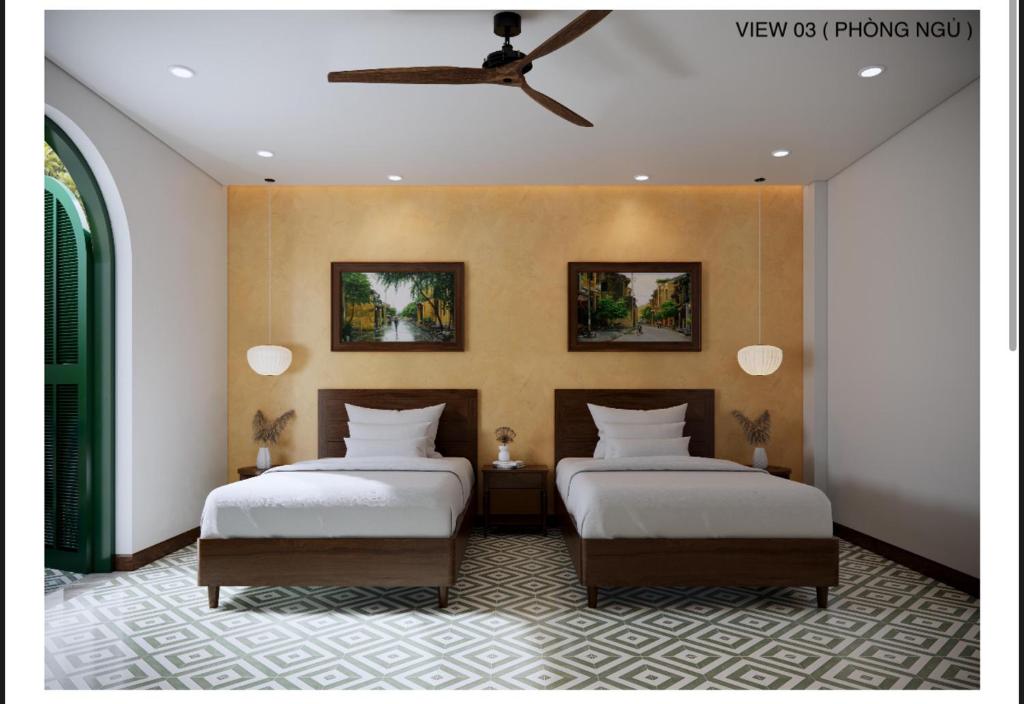 Postel nebo postele na pokoji v ubytování Vang Anh Homestay Hoi An
