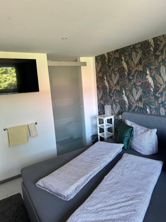 Postel nebo postele na pokoji v ubytování Haus Geiger