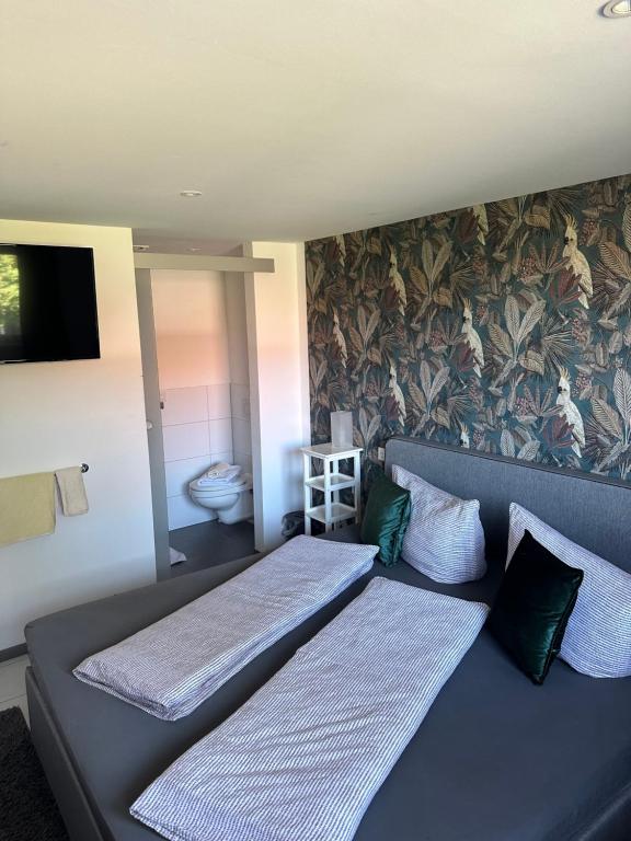 Postel nebo postele na pokoji v ubytování Haus Geiger