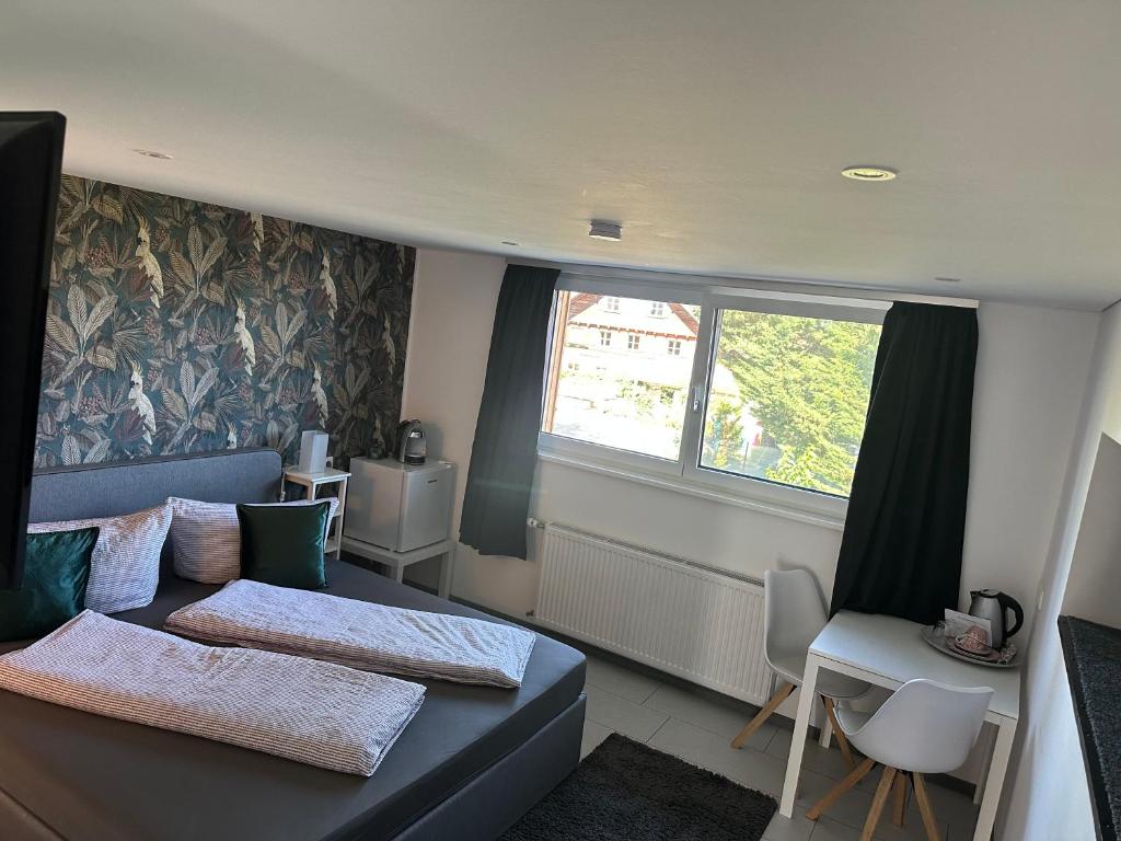 Postel nebo postele na pokoji v ubytování Haus Geiger