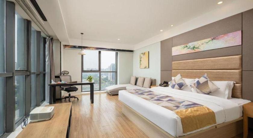 Postel nebo postele na pokoji v ubytování GreenTree Eastern Yancheng Administration Center Hotel