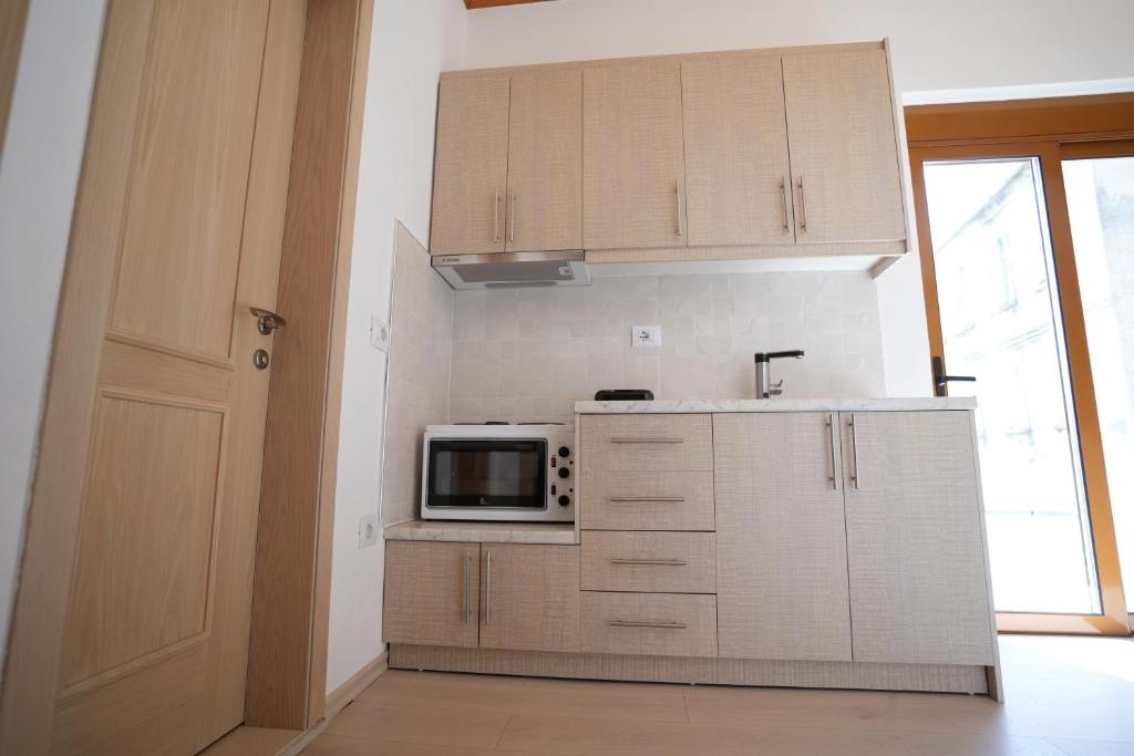 Kuchyň nebo kuchyňský kout v ubytování Jons Apartment