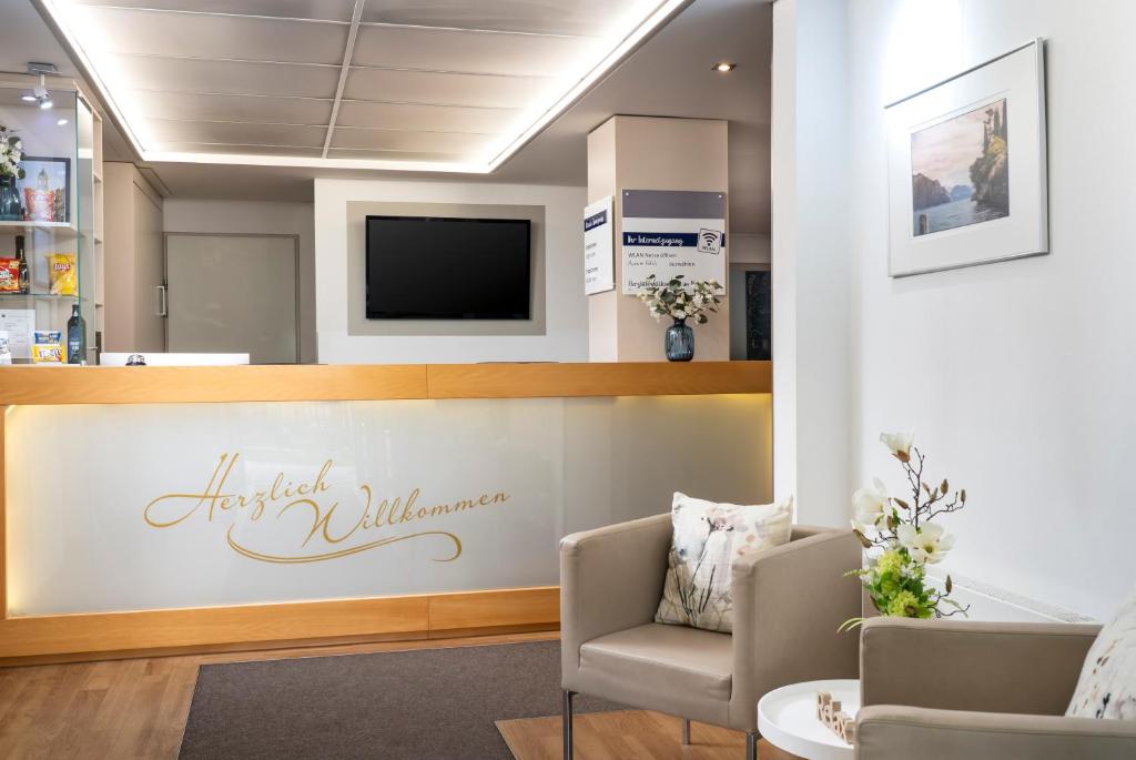 TV a/nebo společenská místnost v ubytování NOVALIS Hotel by AURUM Dresden