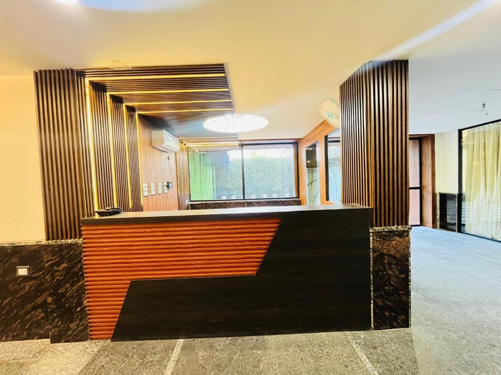 Posezení v ubytování Roomshala 183 Hotel Aroma Chattarpur