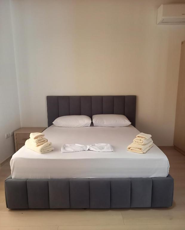 Postel nebo postele na pokoji v ubytování Jons Apartment
