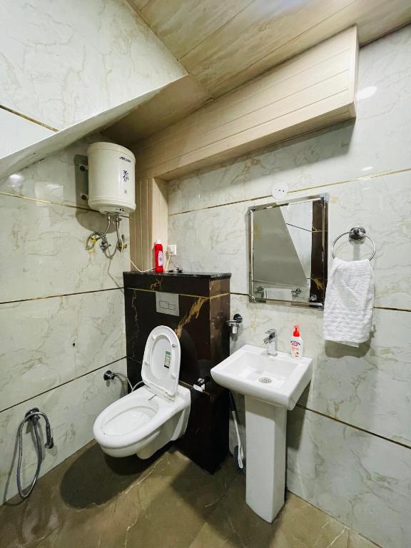Koupelna v ubytování Anand residency
