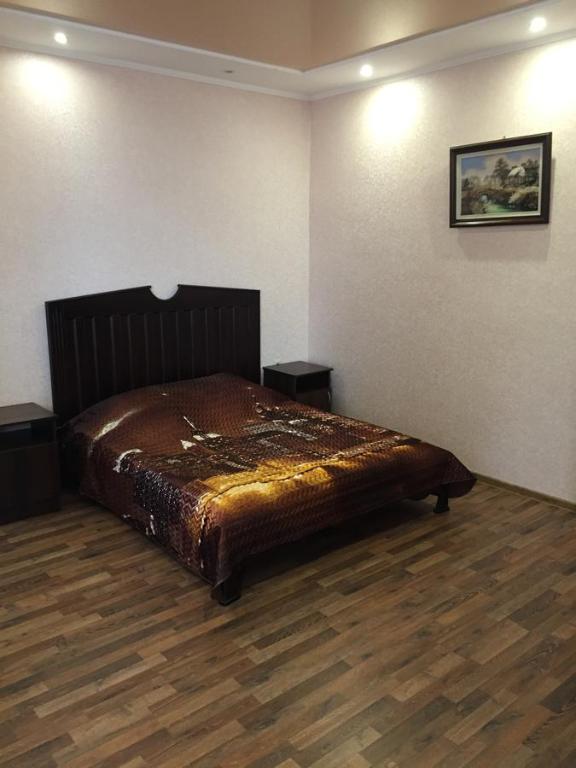 Кровать или кровати в номере Отель «Двин»