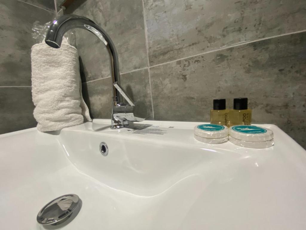 Koupelna v ubytování Rosse Hotel