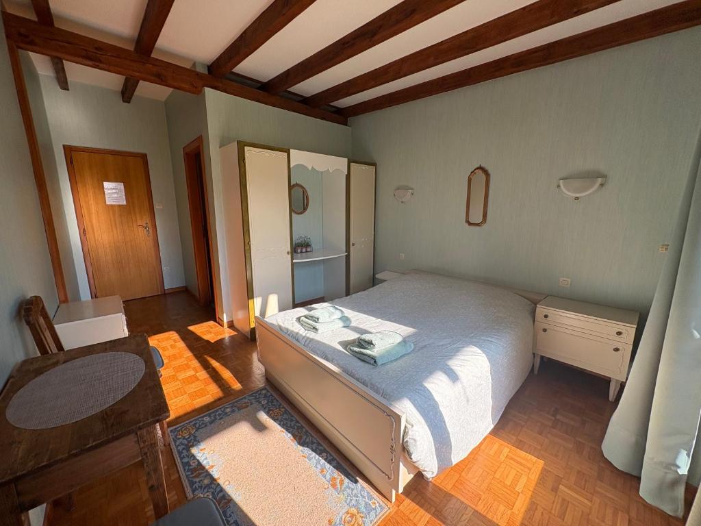 Postel nebo postele na pokoji v ubytování Chambres d'hôtes Monicala