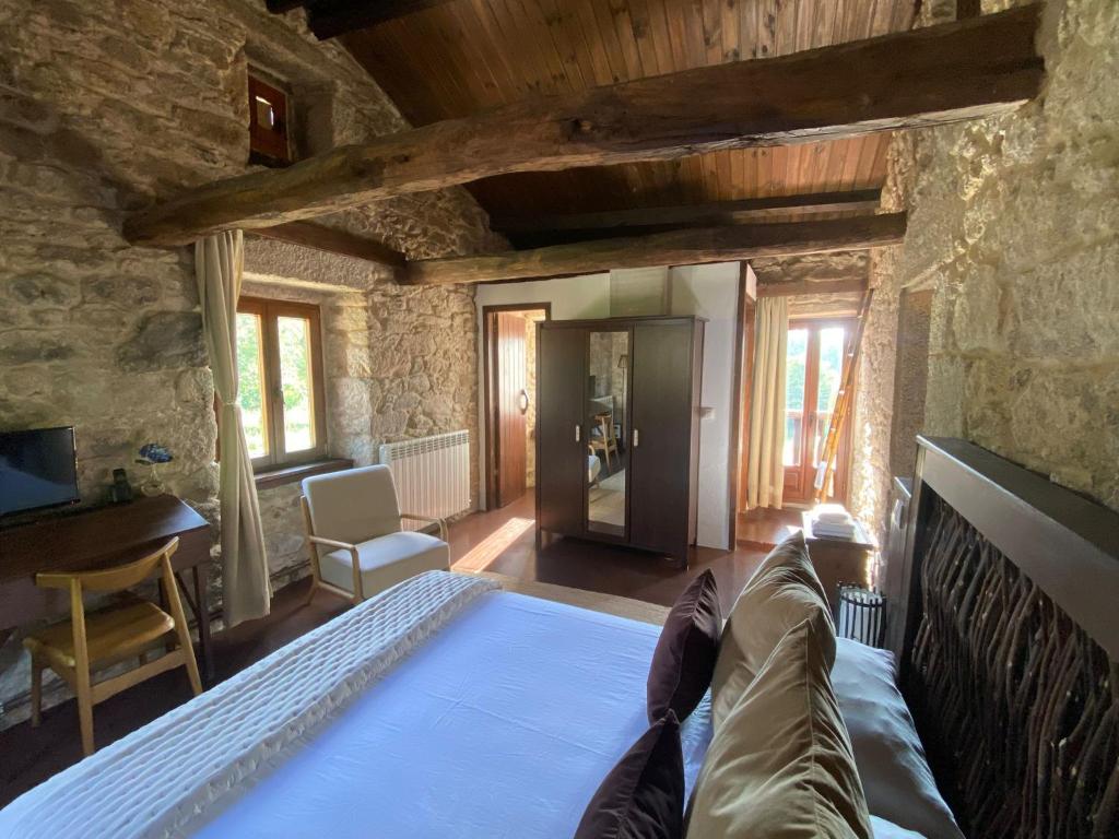 Postel nebo postele na pokoji v ubytování Hotel Rural Casal do Mouro