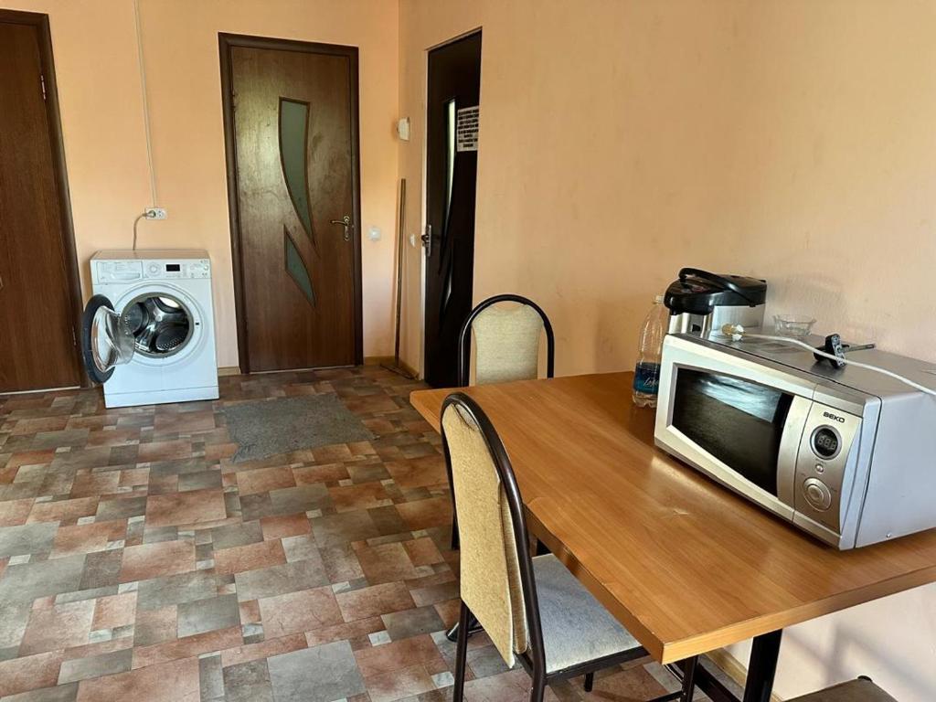 Kuchyň nebo kuchyňský kout v ubytování Kairat property