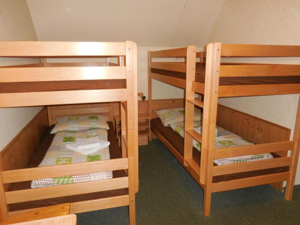 Postel nebo postele na pokoji v ubytování Haus am See