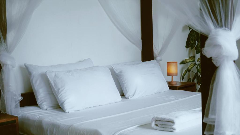 Postel nebo postele na pokoji v ubytování Secret Villa - Unique Experience