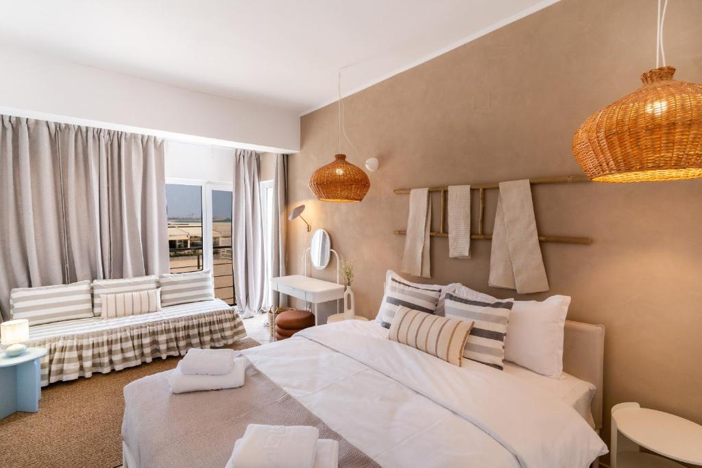 En eller flere senge i et værelse på Rezident Villa Eforie