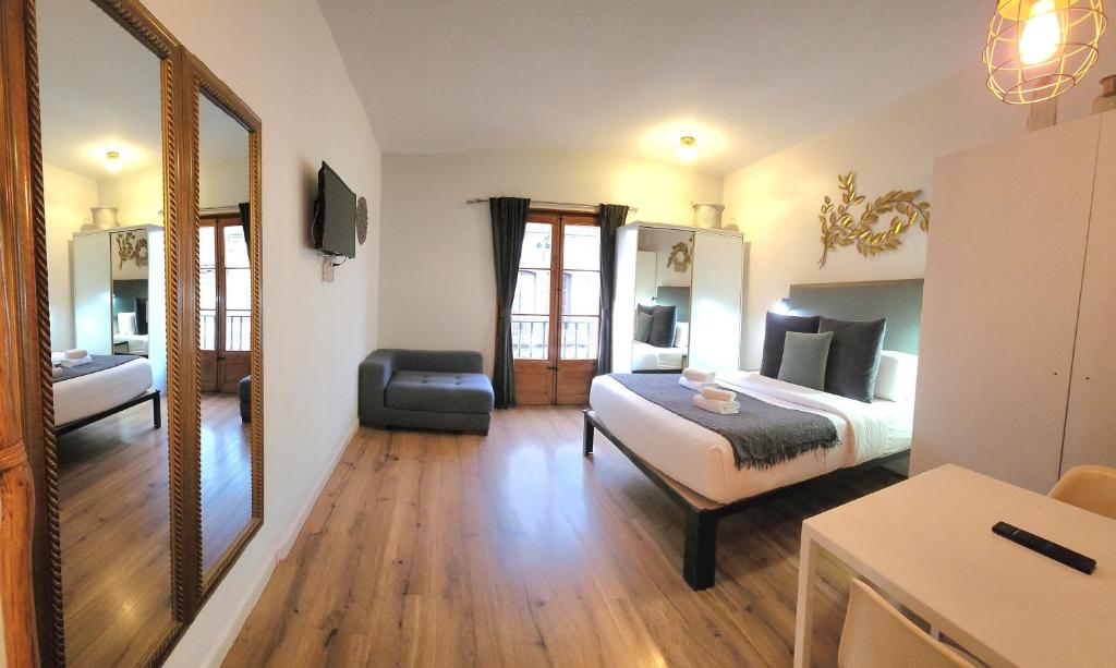 Posteľ alebo postele v izbe v ubytovaní Barrio Gotico Apartments Ferran